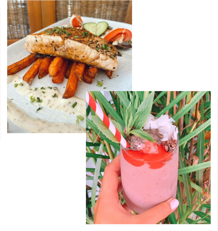 Delicious fish and sweet potato chips with side salad for lunch accompanied by a healthy berry smoothies